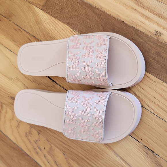 Michael Kors Shoes - Michael Kors Platform Slides, size 8. Never worn